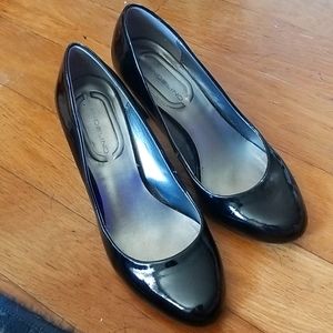 Black patent leather pumps